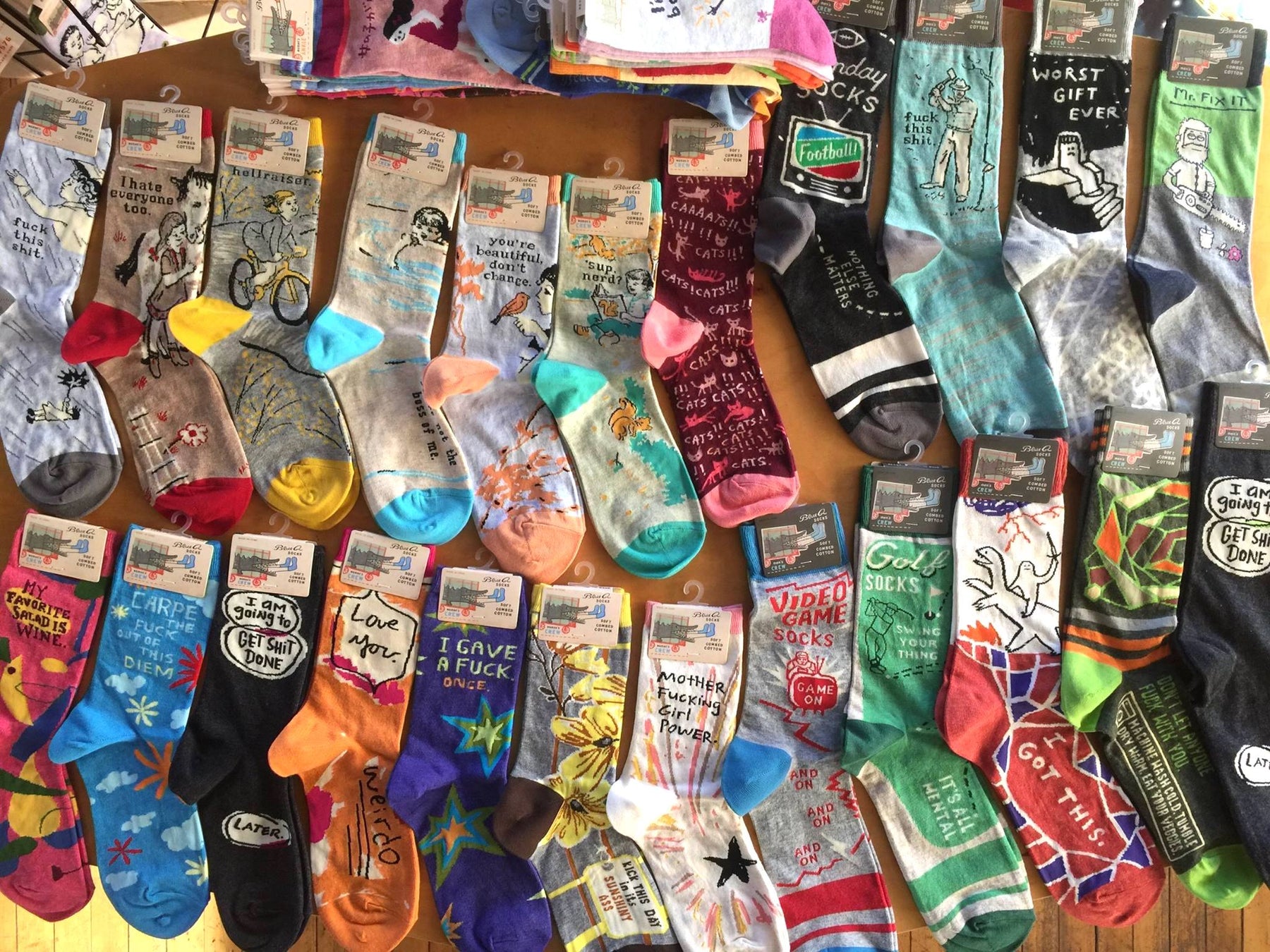 Collection of dozens of Blue Q socks