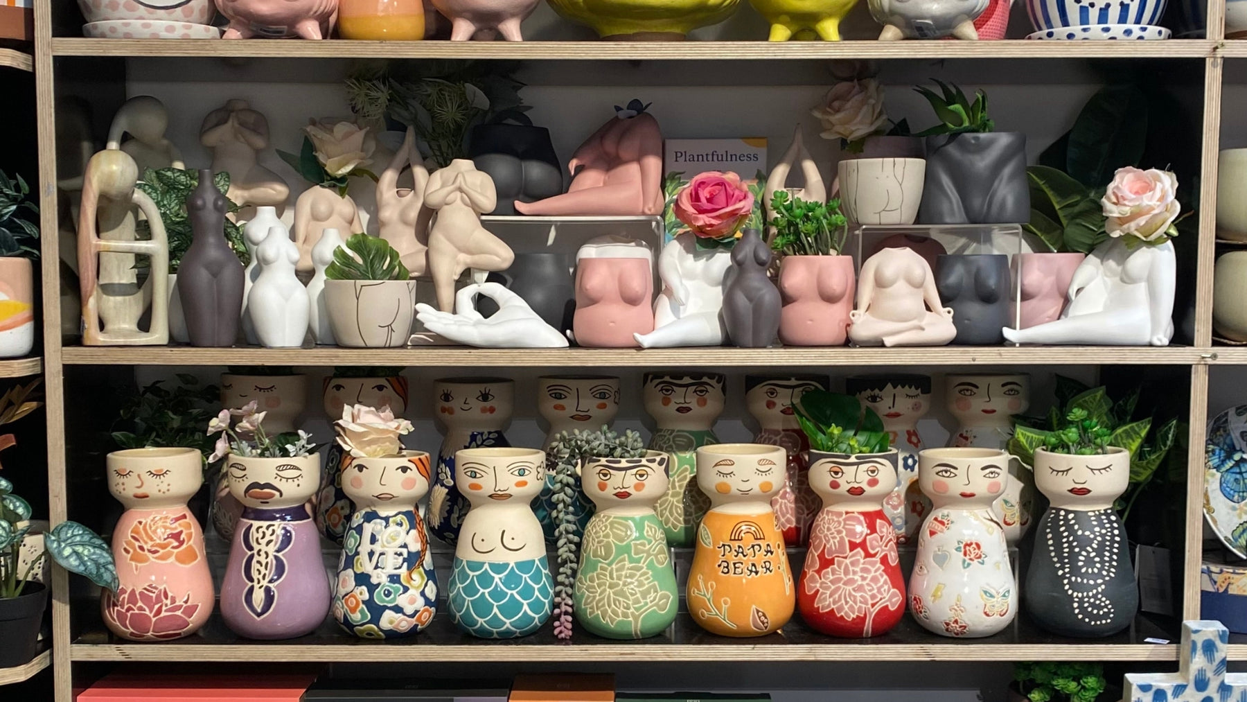 Jones and Co vases on multiple shop shelves