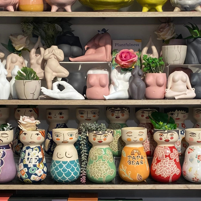 Jones and Co vases on multiple shop shelves