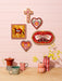 Jones & Co | Fable Pink Small Cross Homing Instincts